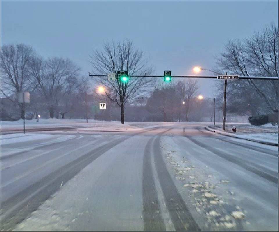 Snowy road at a stoplight