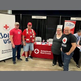 Red Cross staff members and veterans at the National Veterans Golden Age Games.