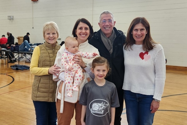 Family of blood recipient and blood drive host.