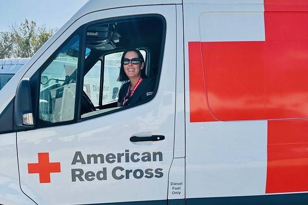Kristie Collins driving an Emergency Response Vehicle