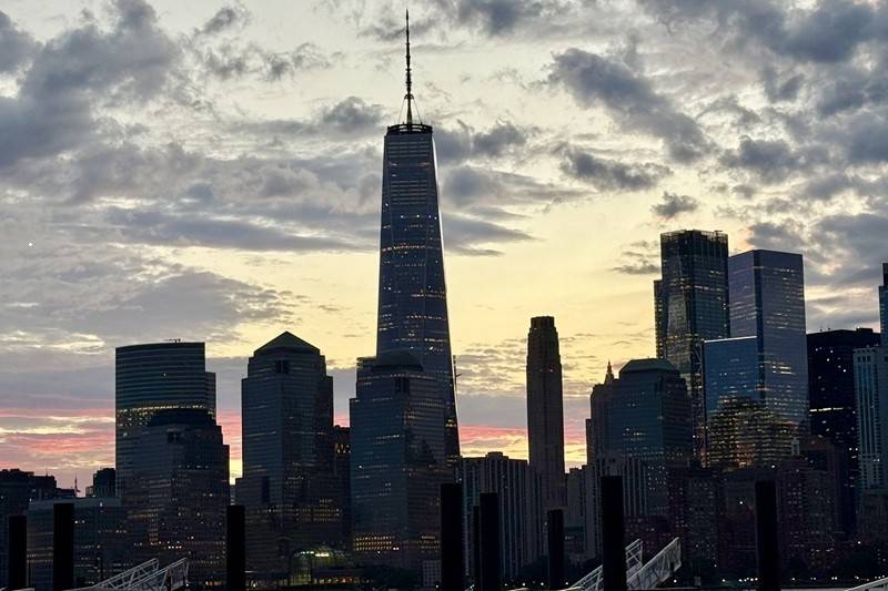 Early morning view of One WTC and NYC skyline across the river from NJ on Sept. 11 2026