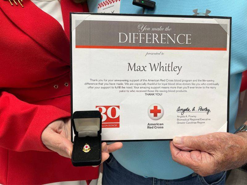 close-up of red cross pin