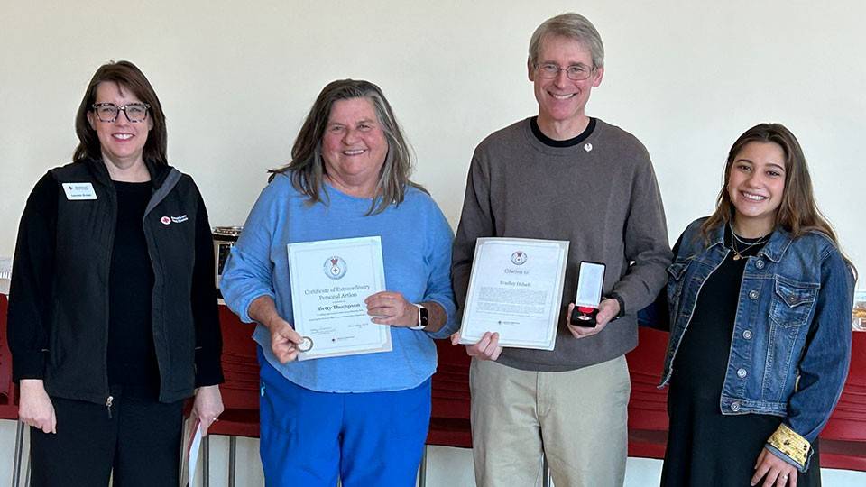 Lejeune High School Nurse and Teacher displaying their American Red Cross Lifesaving Award.