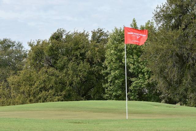 Swing for Relief 2018 Golf Green and Flag Image