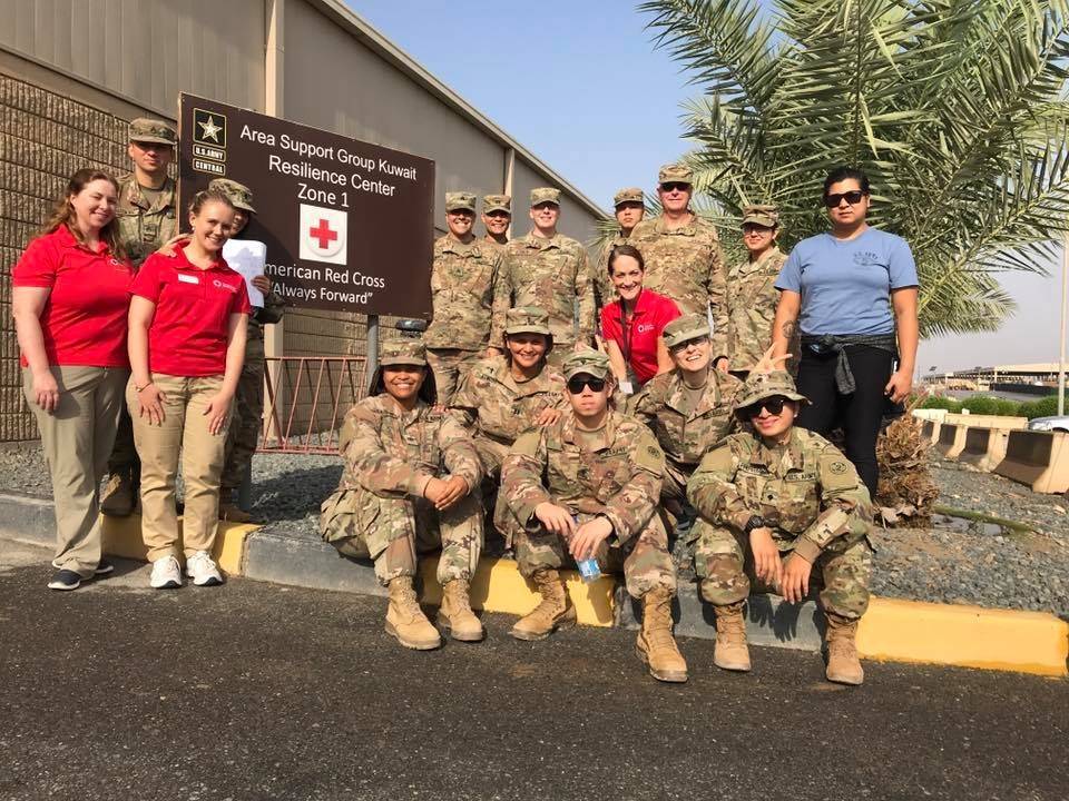 American Red Cross volunteers with military personnel at Camp Arifjan in Kuwait