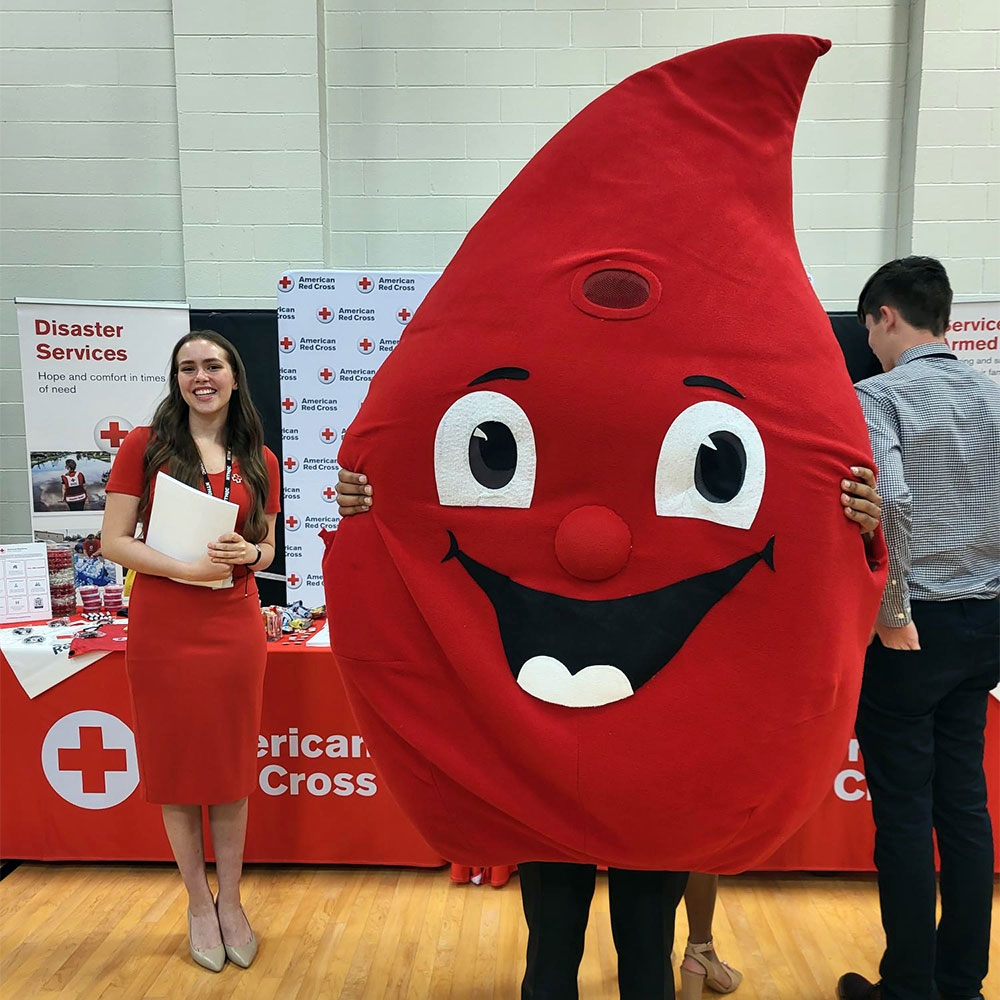 Red Cross blood drop mascot