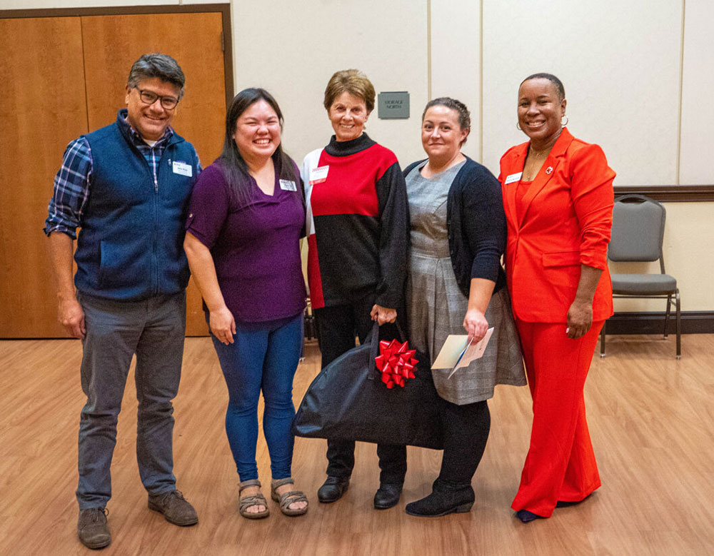 Disaster Cycle Services Team and the and Heart of the Valley Chapter Leadership celebrating Nancy and her dedication to the Red Cross Mission.