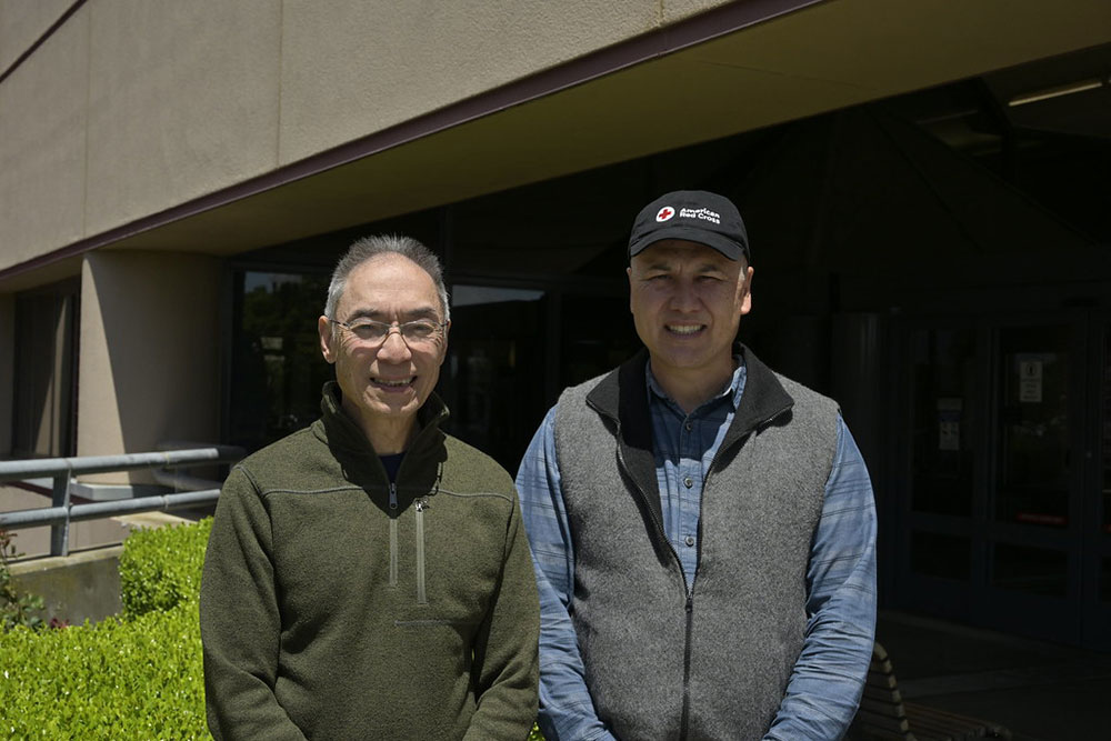 American Red Cross volunteers Dr. Dan Canlas and Dr. Justin Nast at Travis Air Force Base.