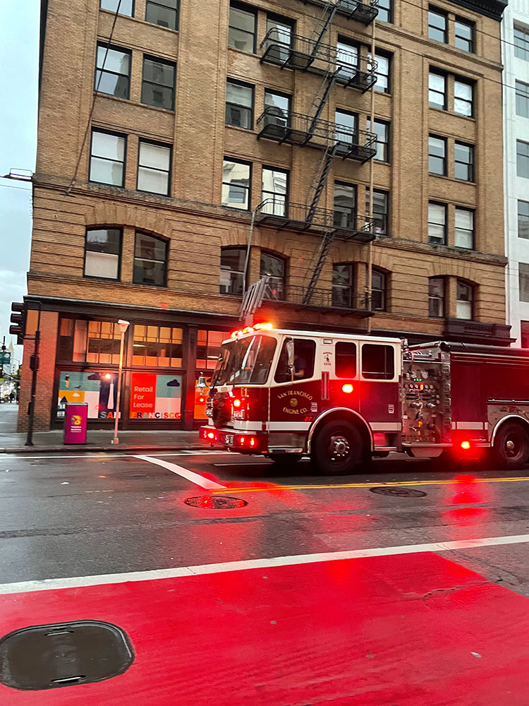 fire engine with emergency lights on.