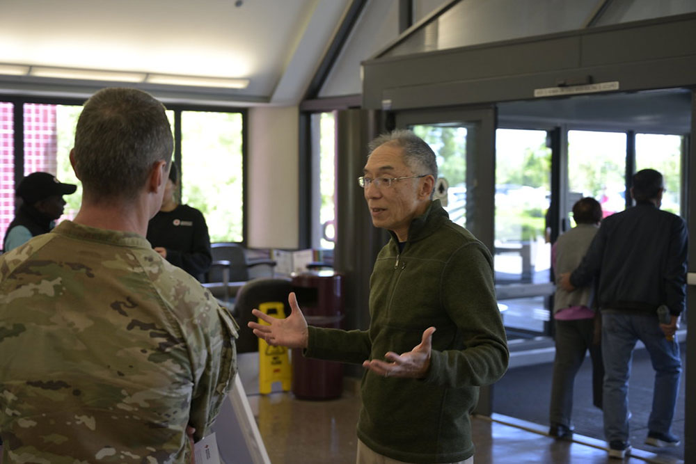 Dr. Dan Canlas speaks with Col. Alexei Kambalov at the David Grant Medical Center at Travis Air Force Base.