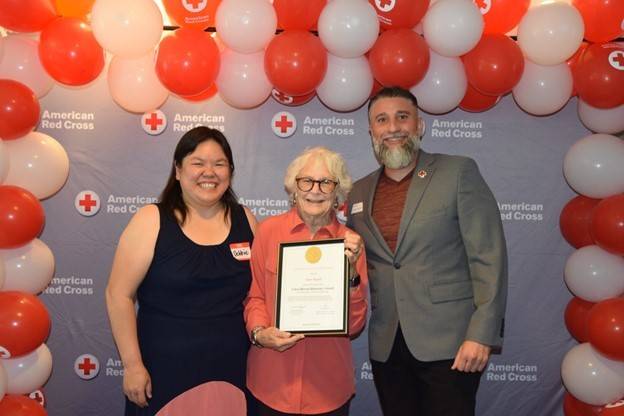 Janet Rogoff (middle) receiving her award from Sr. Community Disaster Program manager, Debbie Yee (left), and North Bay Executive director, Vincent Valenzuela (right)