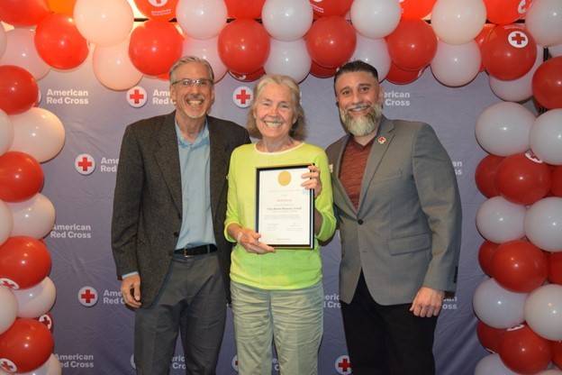 Sheila Dickson (middle) receiving her award from Sonoma Community Disaster Program manager, Leland Montell (left), and North Bay Executive director, Vincent Valenzuela (right)