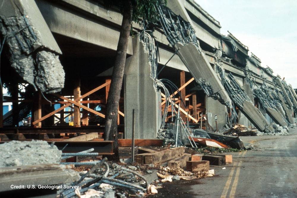 Support column failure and collapsed upper deck on the Cypress viaduct of Interstate 880.