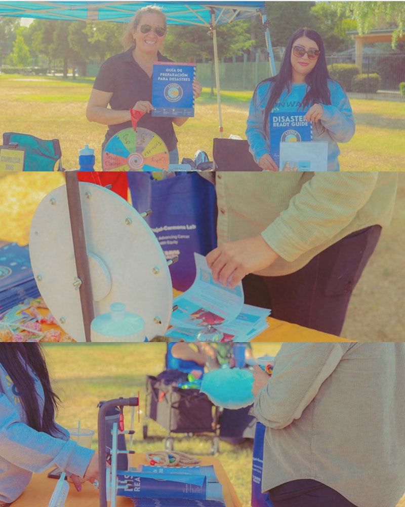 The Valley Onward showing their info at an outside event.