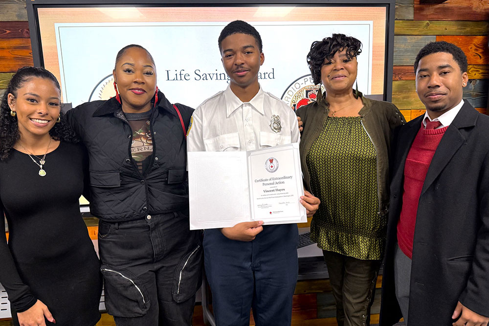Vincent showing his CEPA with his family.