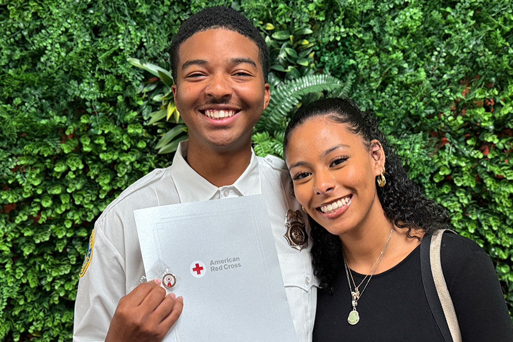 Vincent showing his CEPA with his girlfriend.