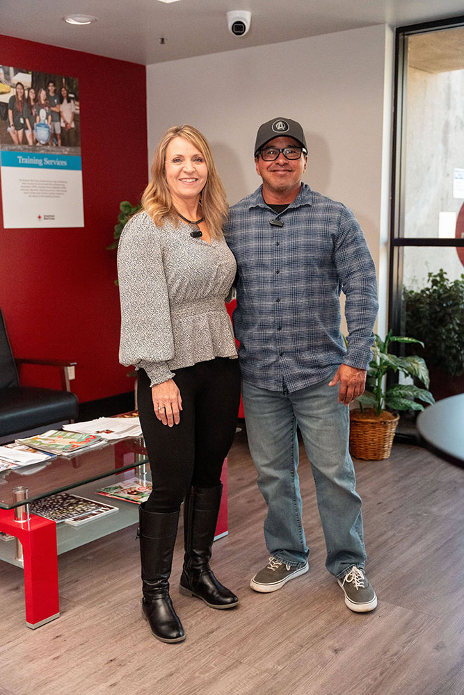 Debbie Vasquez standing next to her husband Phillip Vasquez.