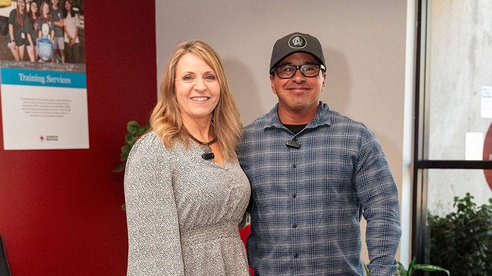 Debbie Vasquez standing next to her husband Phillip Vasquez.