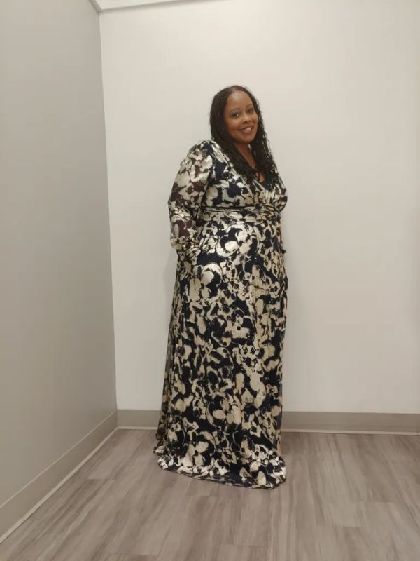 latrese in long gold and black dress