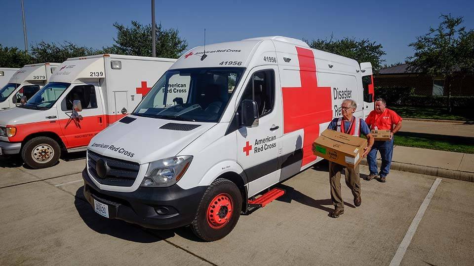 September 8, 2017. Sugar Land, Texas. Emergency Response Vehicle drivers Brett and Jim  loading for the lunch run from Kitchen 11 in Sugar Land, Texas. Photo by Chuck Haupt for the American Red Cross 