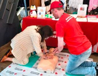 Red Cross volunteer Ben Greenberg teaching a CPR class.