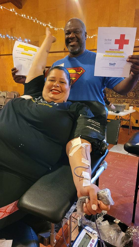 Mia & Shawn Rutland donating blood