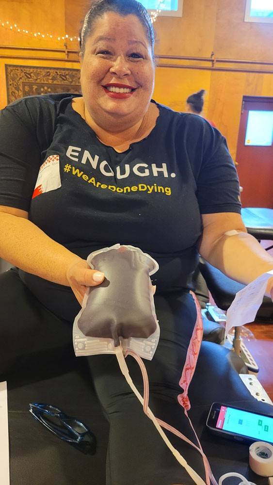 Mia Rutland donating blood