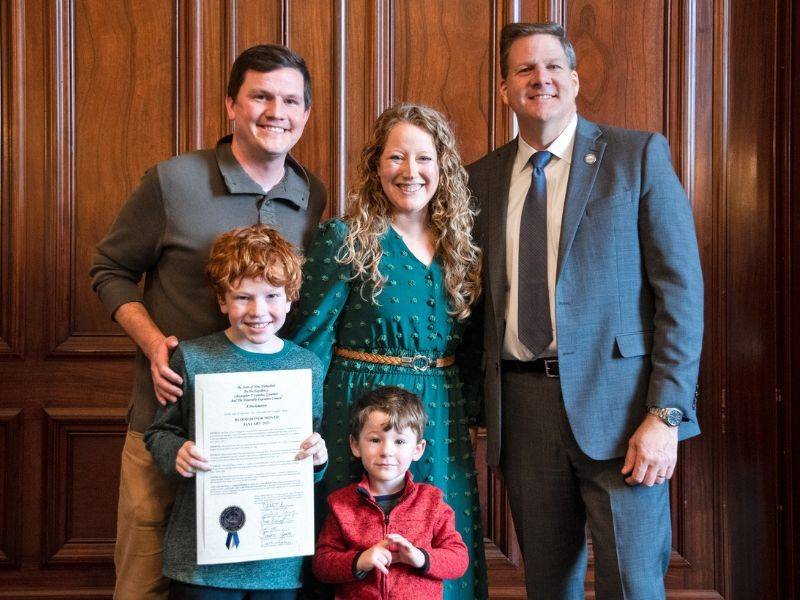Untitled design - NH-Parents-Son-Rate-Diagnosis-story-groupphoto
