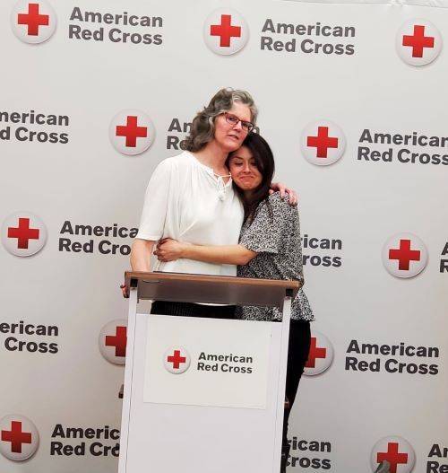 image of two women hugging