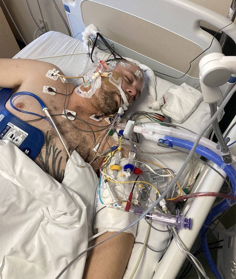 Alex Adams in coma on hospital bed