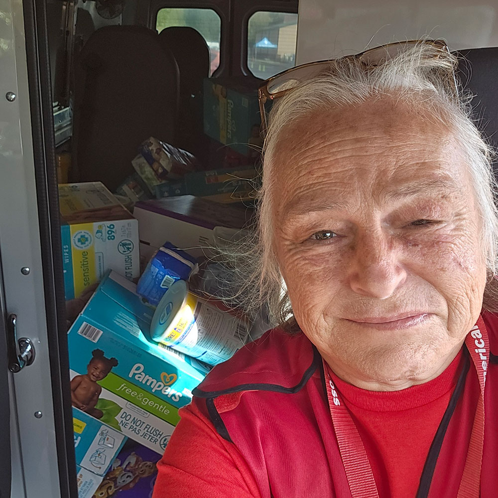 Red Cross volunteer Deb Wilson taking a selfie.