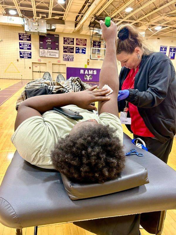 young person donating blood