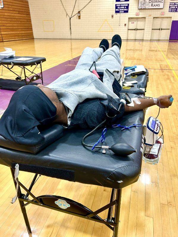 young person donating blood