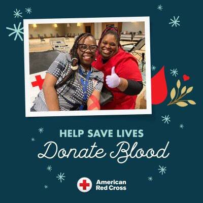 Red Cross nurse and blood donor smiling for camera