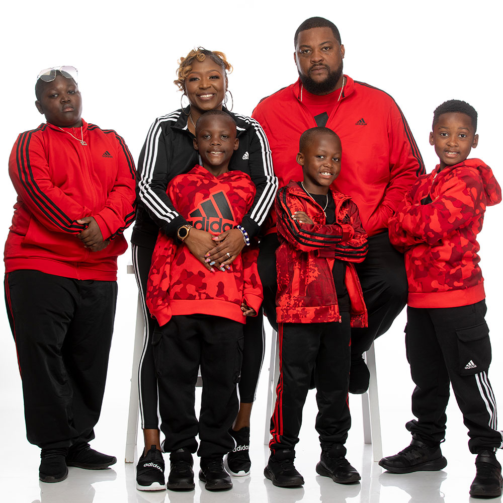 The Scott Family: Eric, La’Shardae, Emory, Evan, Eric and Liam in Adidas outfits.