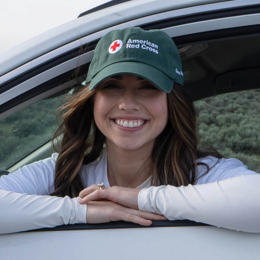woman looking out car windoww