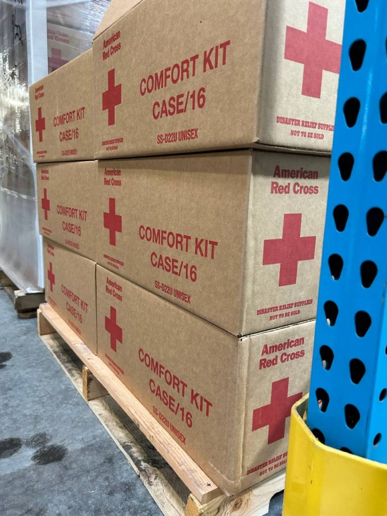 Boxes of comfort kits donated inside a Disaster Field Supply Center 