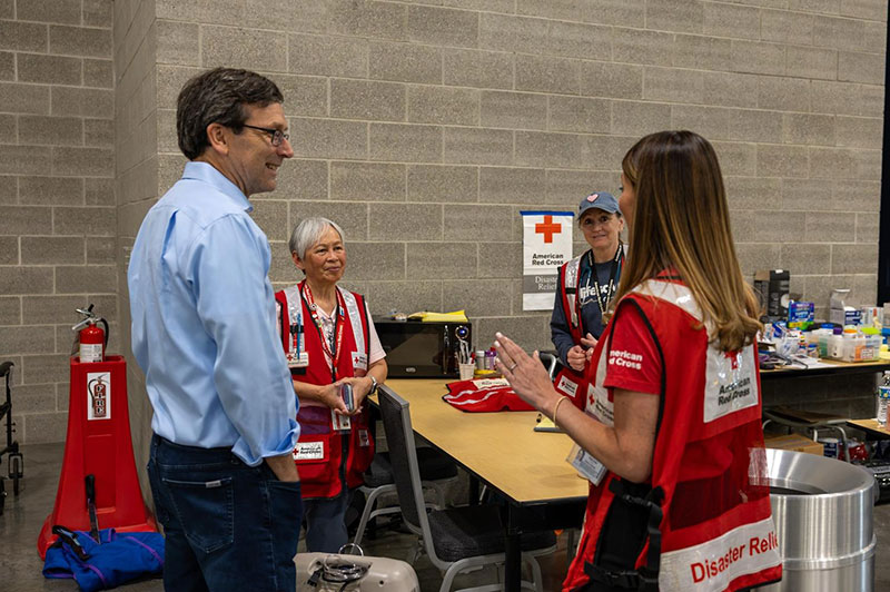 Governor Ferguson speaking with Red Cross staff members.