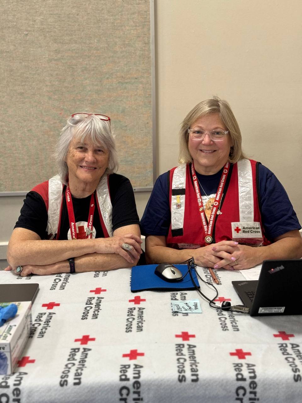 Mary Nichols and Thea Wasche work as Red Cross Pet Liaisons