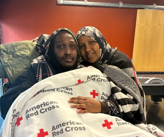 Ubah Dahraan and her son, Abdirauf Isse in a Red Cross shelter