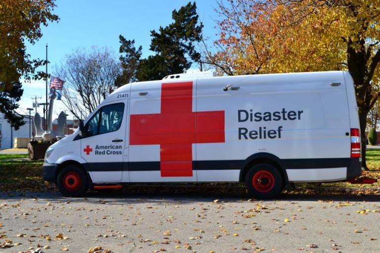  Volunteers Donna Strother and Linda Jones prepare to take the emergency response vehicle back to the chapter office after the ceremony.
