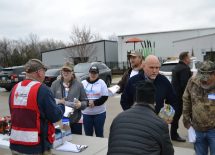 volunteers at check in table