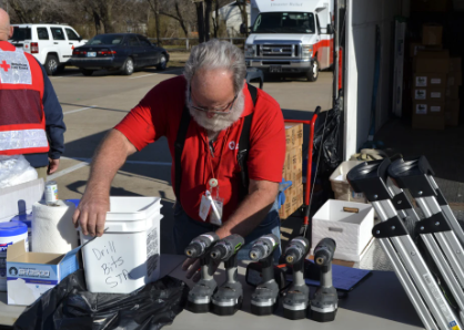 volunteer setting up table