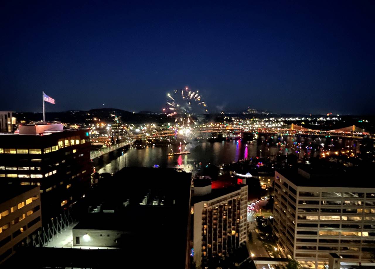 Fireworks over a harbor