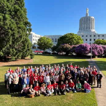 Disaster Academy participants in a team photo on lawn of Willamette University