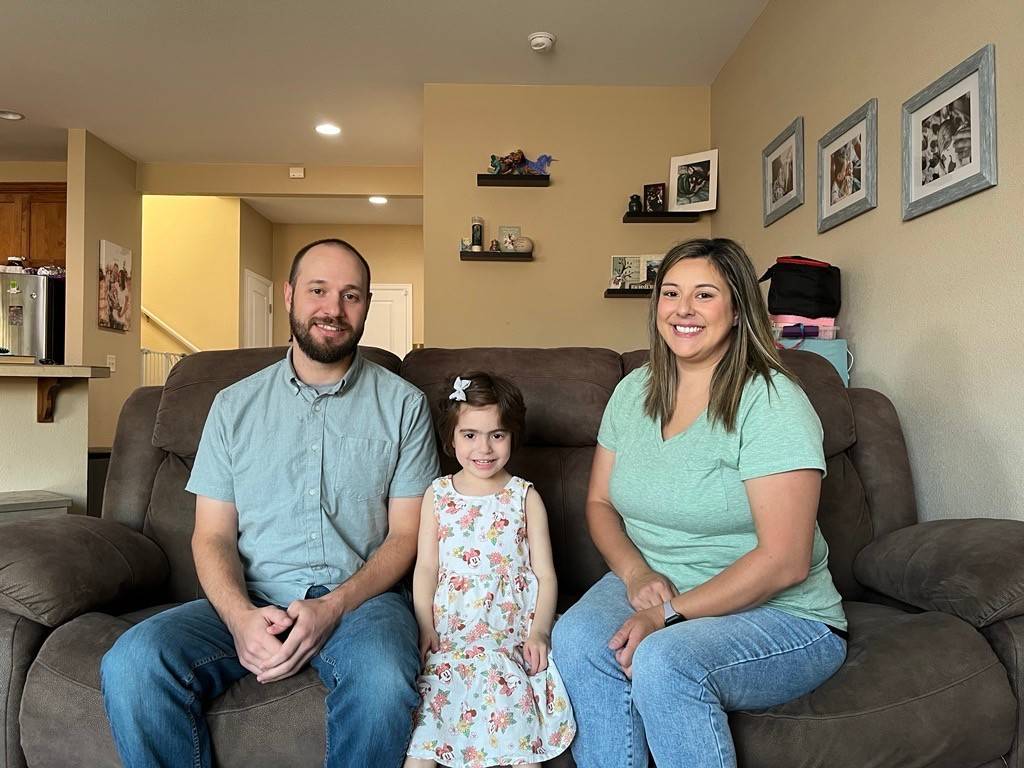 Emmi and her parents, Jared and Stephanie Bradley