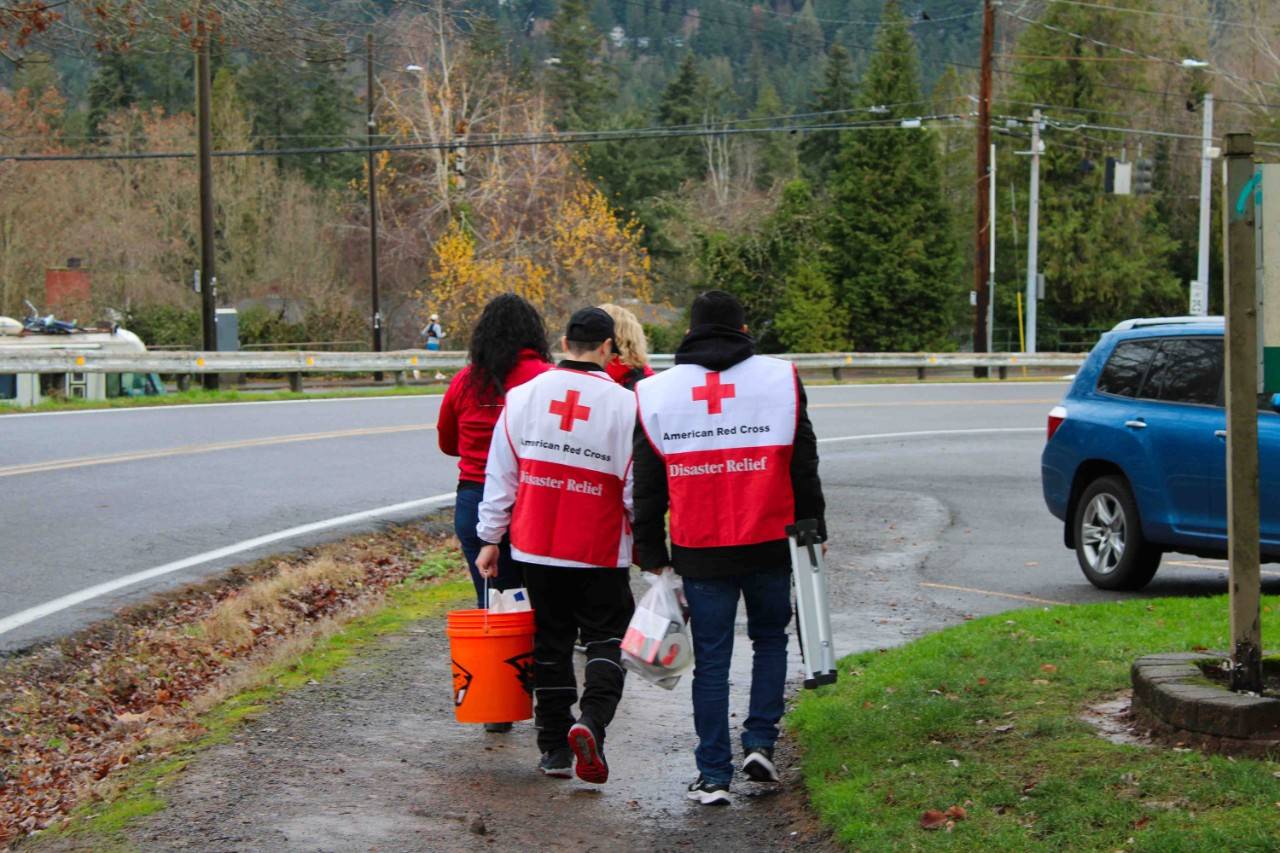 Team of Red Crossers on their way to install fire alarms