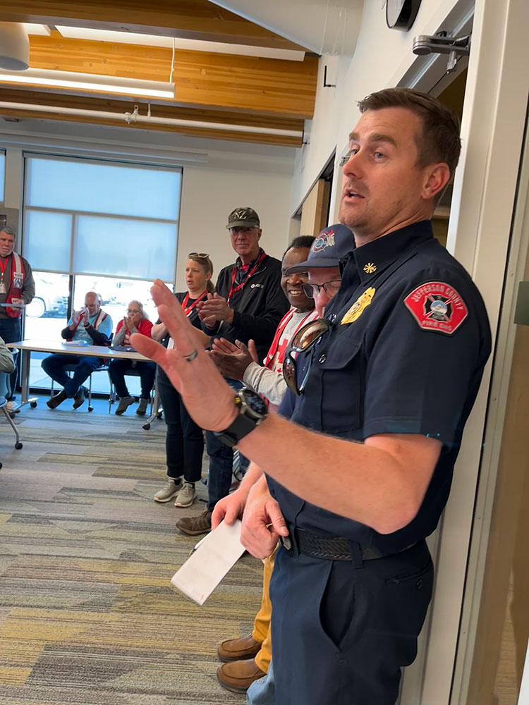 Jefferson County Fire and EMS Deputy Chief Kasey Skaar speaking to room of Red Cross volunteers.