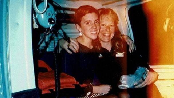 Kate Robinson smiling while standing next to her lifeflight nurse.