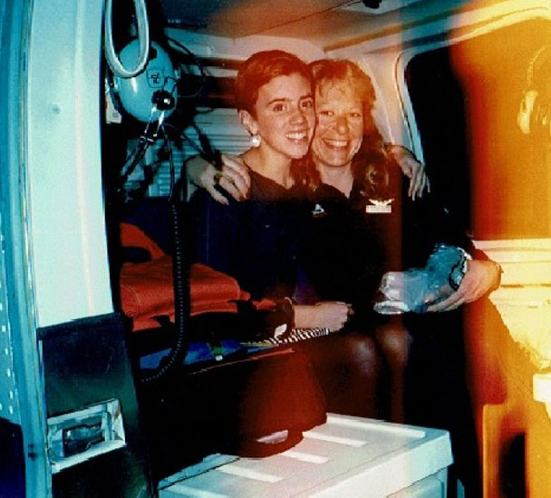 Kate Robinson smiling while standing next to her lifeflight nurse.